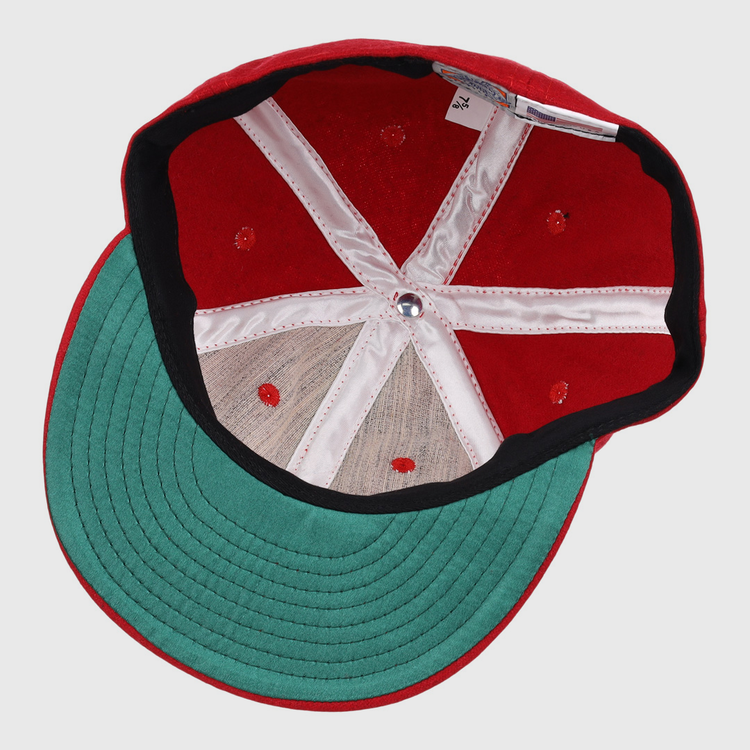 The EFF Greensboro Patriots 1922 Vintage Ballcap in red features a green underside brim, black trim, white internal stitching, and a silver center button.