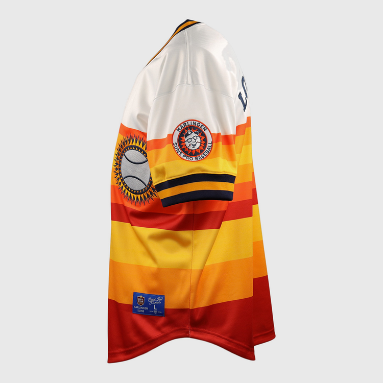The EFF Harlingen Suns EFF Lone Star Baseball Jersey features bold yellow, orange, and red stripes with white shoulders and sleeves, plus sleeve patches of a baseball and the Harlingen Suns team logo from the Lone Star League.