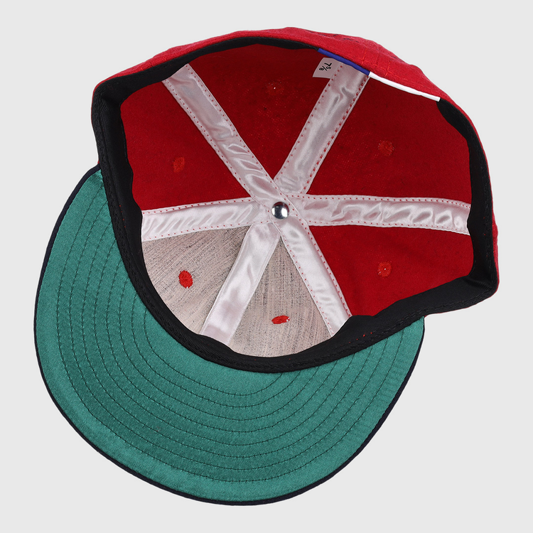Inside view of the Ebbets Field Flannels Harmon Killebrew Signature Series Ballcap, featuring a vintage wool design with a green brim, white support seams, and a silver crown button.