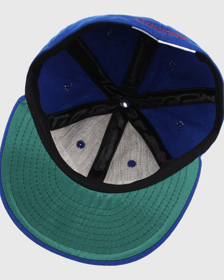 The underside of the EFF Havana Cubans Letterhead Wool Vintage Ballcap features a green brim, black inner lining, and exposed stitching on the interior panels.