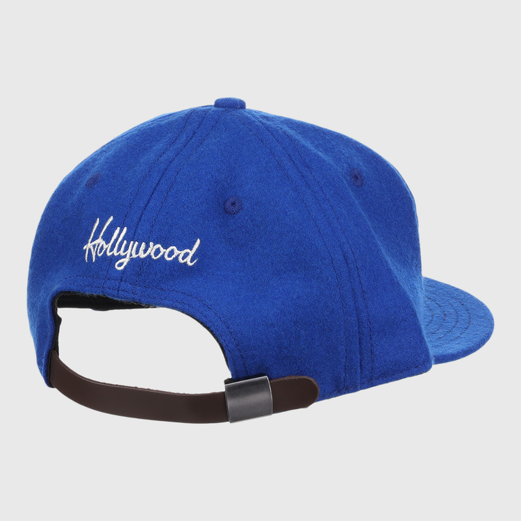 The EFF Hollywood Stars Letterhead Wool Vintage Ballcap features Hollywood embroidered in white on the back, an adjustable brown strap with metal buckle, and classic Pacific Coast League-inspired style.