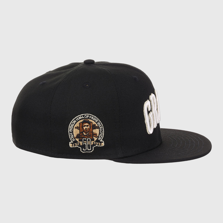 The EFF Homestead Grays Josh Gibson Fitted Ballcap in black features white embroidered lettering, a side patch with Josh Gibson’s portrait, “50,” and “Hall of Fame Induction” in gold and white, making it a true limited edition hat.