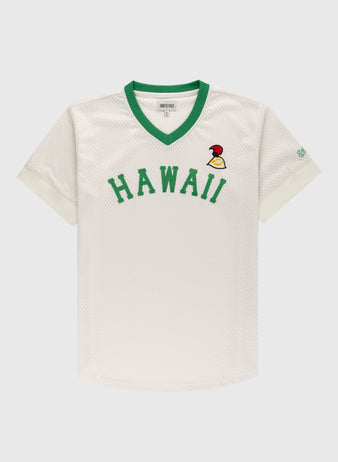 The Ebbets Field Hawaii Islanders (PCL) Mesh V-Neck Jersey features white mesh, green HAWAII text, a small bird logo, green V-neck collar, and white cuffs—throwback style inspired by classic Islanders baseball jerseys. Displayed on a plain background.