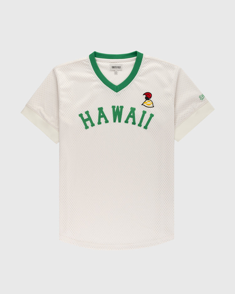 The Ebbets Field Hawaii Islanders (PCL) Mesh V-Neck Jersey features white mesh, green HAWAII text, a small bird logo, green V-neck collar, and white cuffs—throwback style inspired by classic Islanders baseball jerseys. Displayed on a plain background.