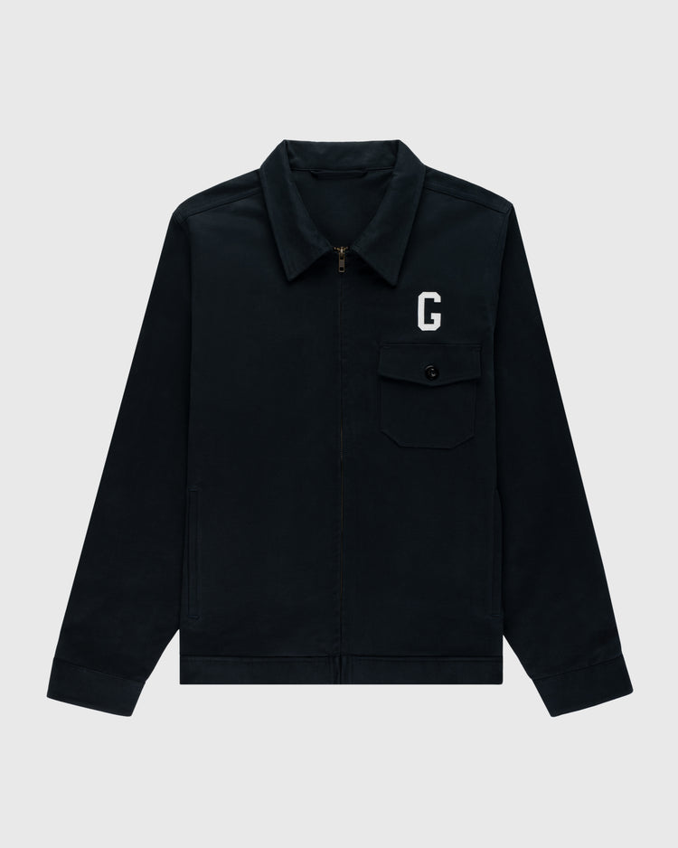 The Ebbets Field Flannels Homestead Grays Cotton Grounds Crew Jacket features black cotton twill, a front zipper, buttoned chest pocket, and a white G patch on the left chest, set against a plain light gray background.