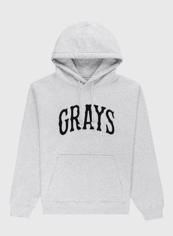 The Ebbets Field Flannels Homestead Grays Heavyweight Cotton Terry Pullover Hoodie features light gray fabric, a front pocket, and bold black GRAYS lettering—honoring the legendary team and Negro Leagues Baseball Museum history.