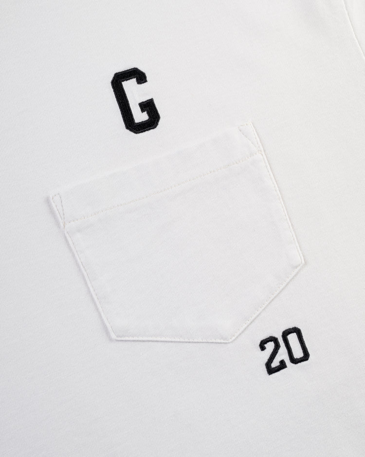 Close-up of the Ebbets Field Flannels Homestead Grays Embroidered G Long Sleeve Pocket Tee, featuring a black G and the number 20 above the pocket—a tribute to Hall of Famer Josh Gibson and the legendary Negro Leagues team.
