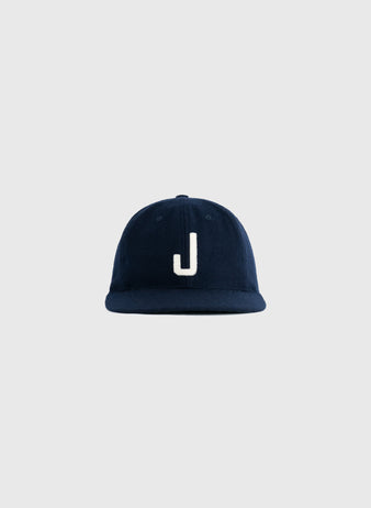The EFF Joplin Miners 1950 Authentic Wool Ballcap, in navy with a white uppercase J on the front, is inspired by the style worn by Mickey Mantle and shown against a plain light gray background.