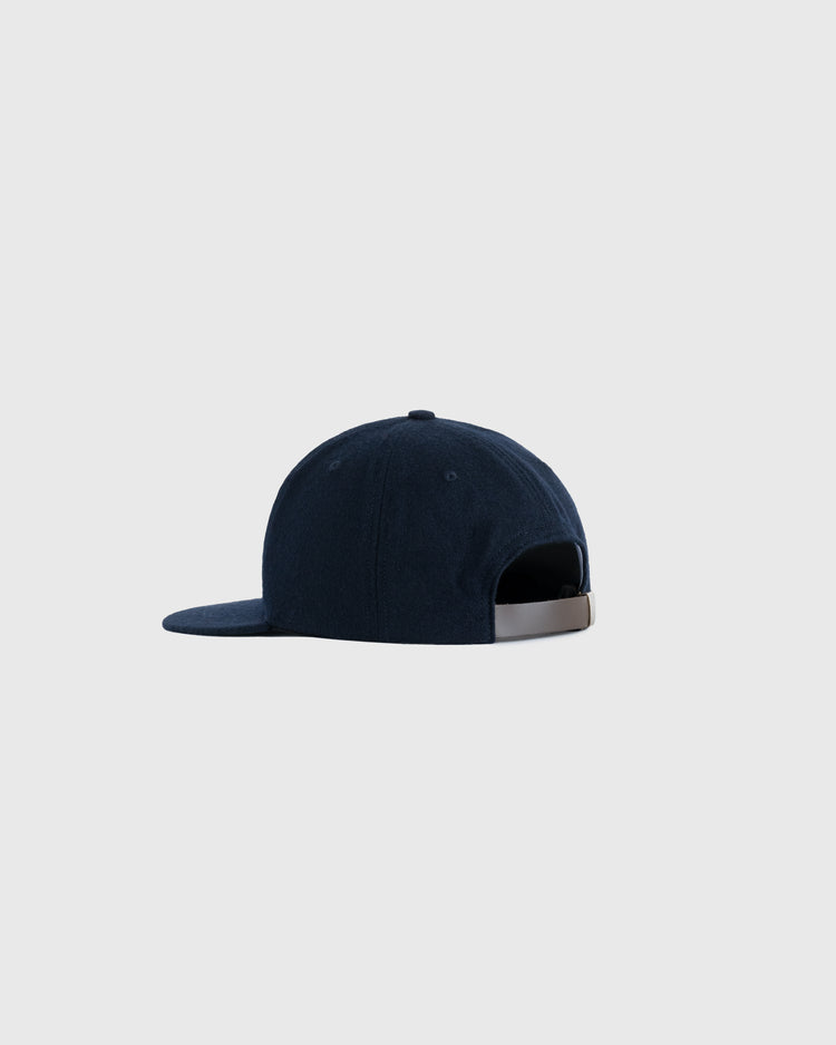 A Kansas City Katz 1961 Authentic Wool Ballcap by EFF is shown from the back, displaying its adjustable strap and curved brim against a plain light gray background.