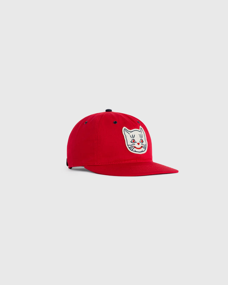 The Kansas City Katz Cotton Twill Ballcap by EFF in red features a white embroidered cartoon cat face patch on the front, shown against a plain light gray background.