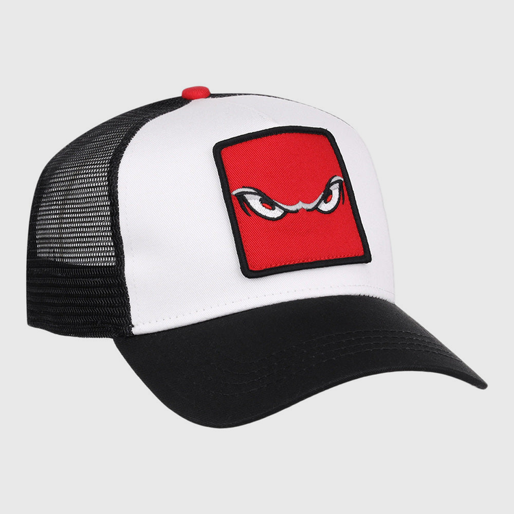 The Ebbets Field Lake Elsinore Storm MiLB Trucker Ballcap features a white front, black mesh back, and black curved brim with a red square patch displaying stylized, angry eyes embroidered on the front.