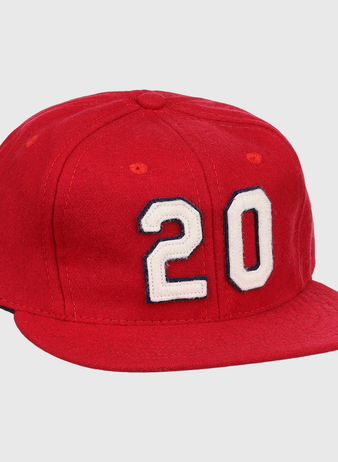 The Lou Brock Signature Series Ballcap by Ebbets Field Flannels is a vintage red wool flat-brim cap, featuring the number 20 in white with black outline on the front—a timeless tribute to the Hall of Famer.
