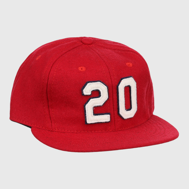 The Lou Brock Signature Series Ballcap by Ebbets Field Flannels is a vintage red wool flat-brim cap, featuring the number 20 in white with black outline on the front—a timeless tribute to the Hall of Famer.