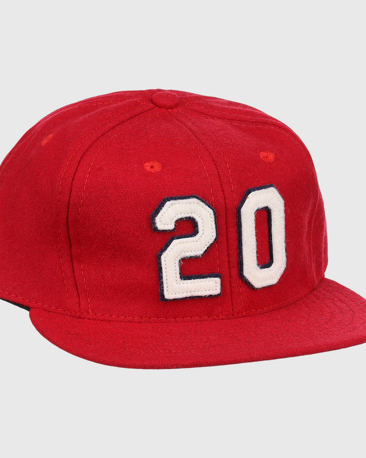 The Lou Brock Signature Series Ballcap by Ebbets Field Flannels is a vintage red wool flat-brim cap, featuring the number 20 in white with black outline on the front—a timeless tribute to the Hall of Famer.