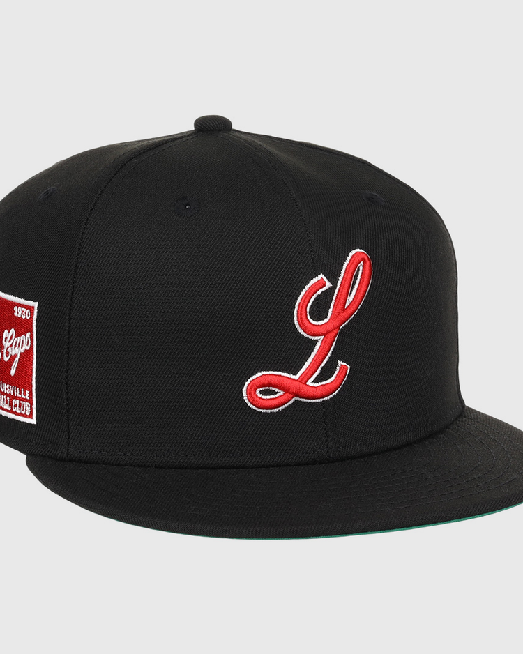 The EFF Louisville Black Caps NLB Team Color Fitted Ballcap is a black vintage-inspired hat featuring a red and white L and a Louisville Baseball Club patch, honoring the Negro National League era.