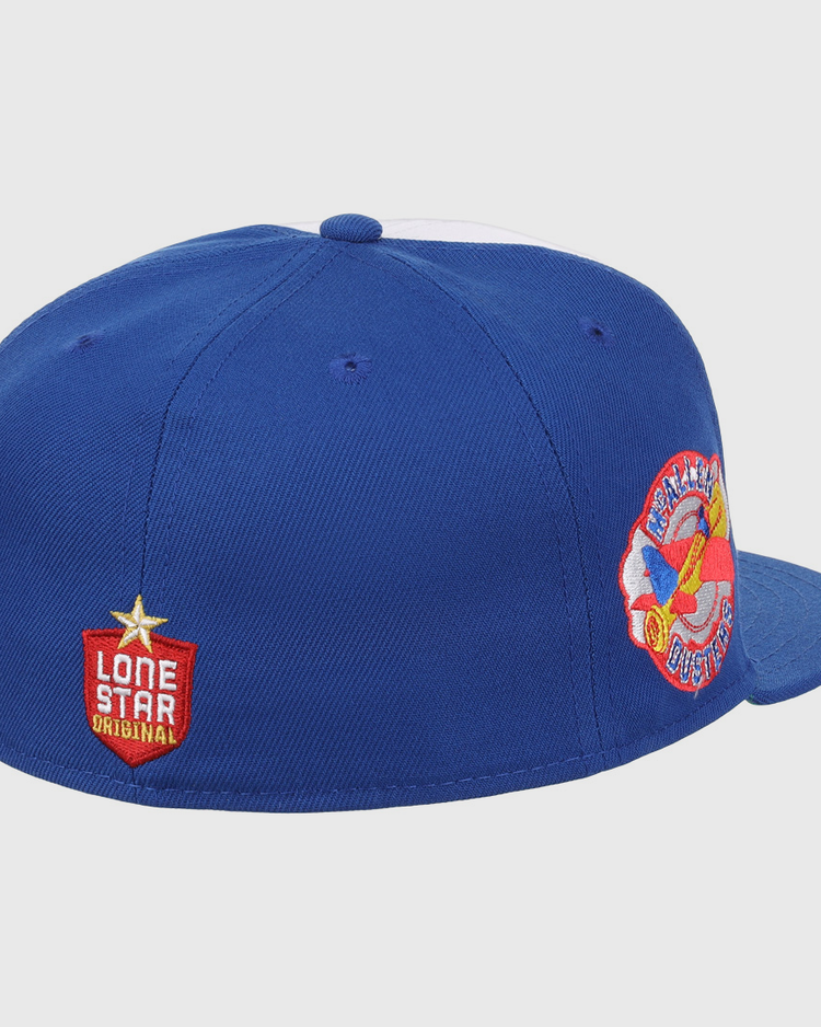 The EFF McAllen Dusters Lone Star Fitted Ballcap features a blue design, plane patch, and a red shield with Lone Star Original—a perfect collectible for fans of the McAllen Dusters or the Lone Star League.