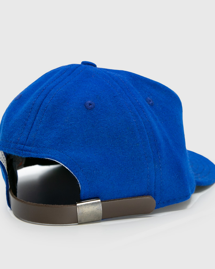 The EFF Memphis Red Sox 1944 Vintage Ballcap is a blue wool cap shown from the back, featuring a brown adjustable strap with a silver buckle, curved brim, visible stitching, and classic styling.
