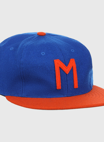 The EFF Morgan State University 1975 Vintage Ballcap features a blue crown, orange brim, and orange M on the front—crafted from genuine wool, its ideal for fans of classic style.
