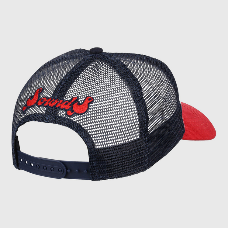 The Ebbets Field Nashville Sounds MiLB Logo Wordmark Trucker Ballcap is a navy mesh cap with a red brim, 
