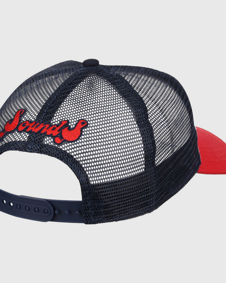 The Ebbets Field Nashville Sounds MiLB Logo Wordmark Trucker Ballcap is a navy mesh cap with a red brim, 