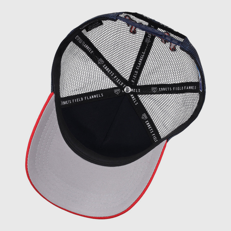 The underside of the Nashville Sounds MiLB Logo Wordmark Trucker Ballcap by Ebbets Field features black mesh panels, a gray brim with a red edge, and black interior taping labeled Ebbets Field Flannels.