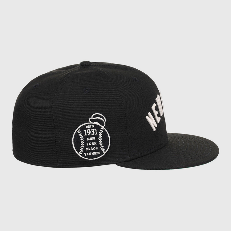 The Ebbets Field New York Black Yankees NLB Black/White Fitted Ballcap features white embroidered 