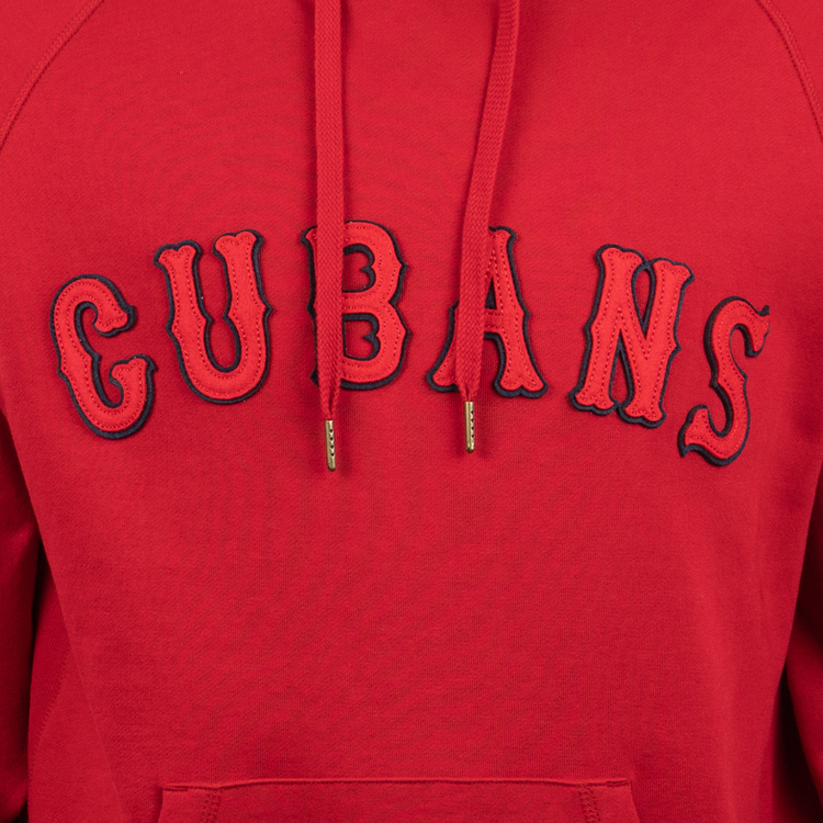 A close-up of the EFF New York Cubans French Terry Script Hooded Sweatshirt, featuring bold CUBANS lettering across the chest that honors the historic Negro National League team, with two drawstrings hanging down the front.