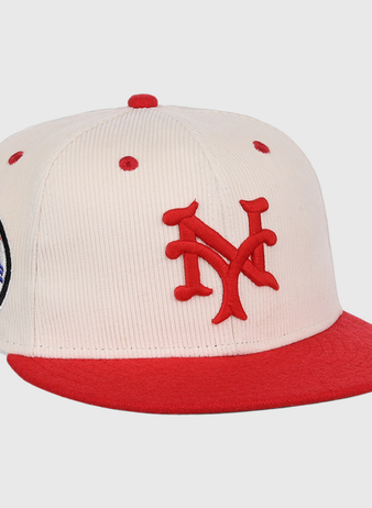 The EFF New York Cubans NLB Ground Rule Double Fitted Ballcap is a cream cap with a red brim, 3D NY embroidery, and a circular New York Cubans patch, inspired by Negro National League style.