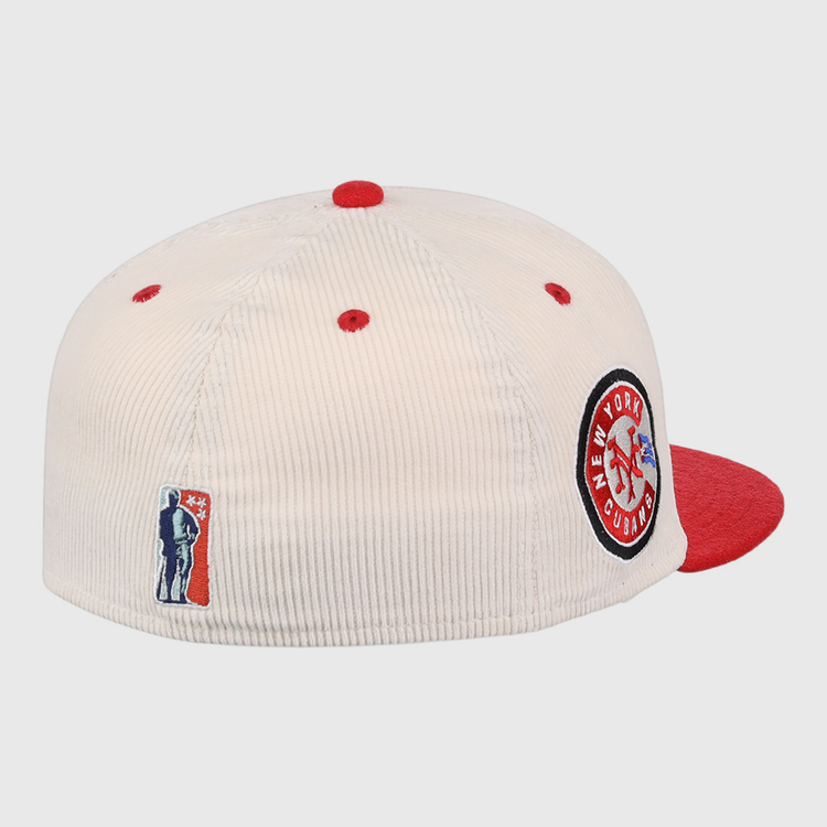 The EFF New York Cubans NLB Ground Rule Double Fitted Ballcap features a cream corduroy design with red accents and brim, a side patch honoring the Negro National League, and an embroidered baseball player logo above the back opening.