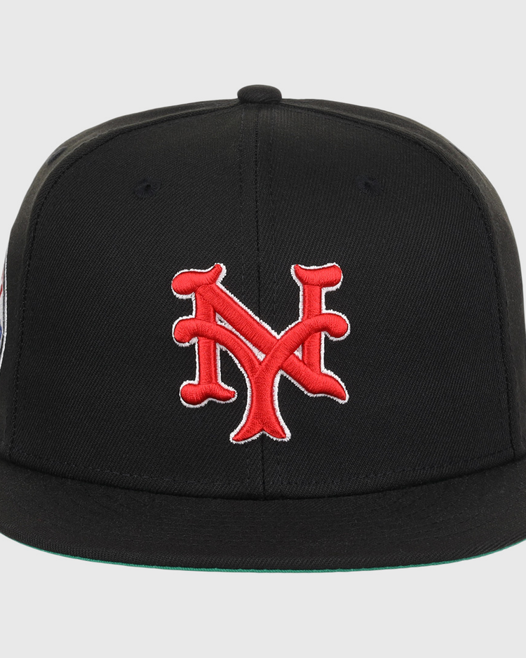 The EFF New York Cubans NLB Team Color Fitted Ballcap is a black vintage-style cap with a bold red 3D NY logo, honoring the Negro National League.