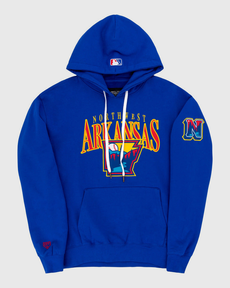 The Ebbets Field Northwest Arkansas Naturals MiLB Cotton Hooded Sweatshirt is royal blue with an Arkansas outline and claw marks on the front, a stylized N logo, an embroidered N patch on the left sleeve, and a red logo on the right cuff.