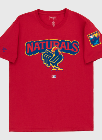 The Ebbets Field Northwest Arkansas Naturals MiLB Fashion Cotton Short Sleeve Tee is a red shirt with a large stylized rooster graphic and 
