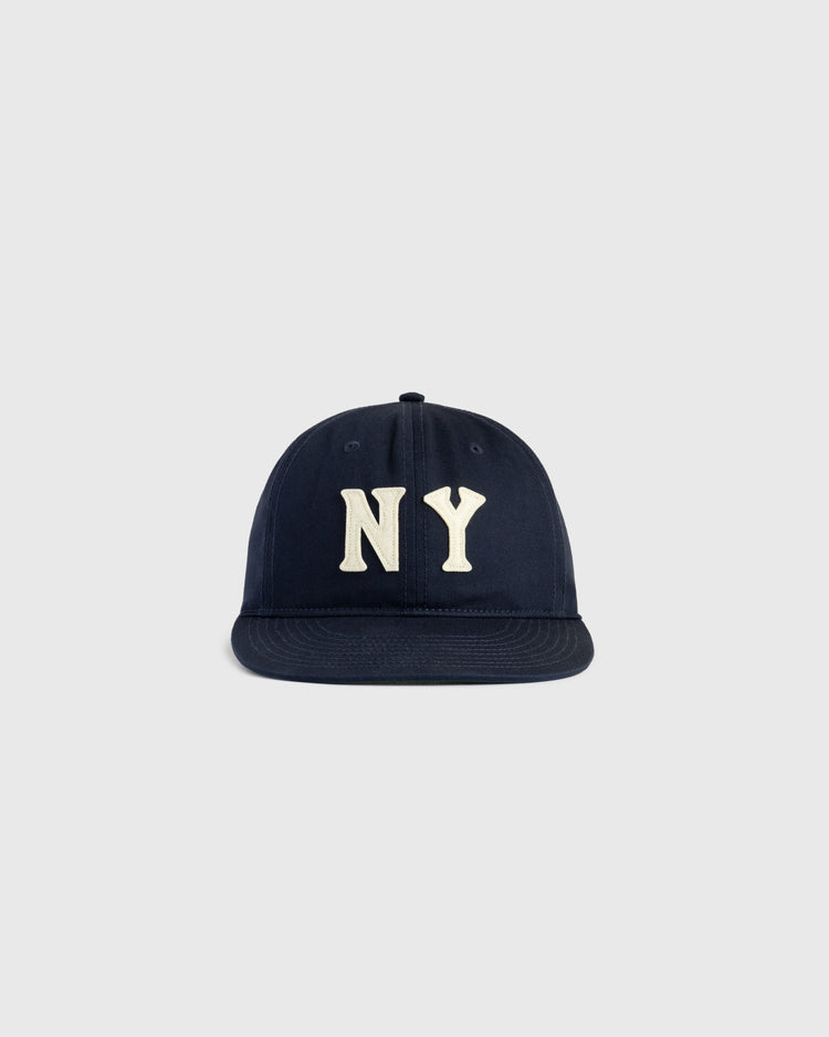 The Ebbets Field New York Black Yankees Felt NY Cotton Twill Ballcap features large white NY embroidery on the front and is shown against a plain light grey background.