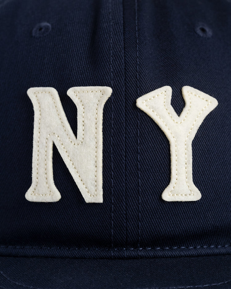 Close-up of the Ebbets Field New York Black Yankees Felt NY Cotton Twill Ballcap, featuring large white felt NY letters stitched on the front.