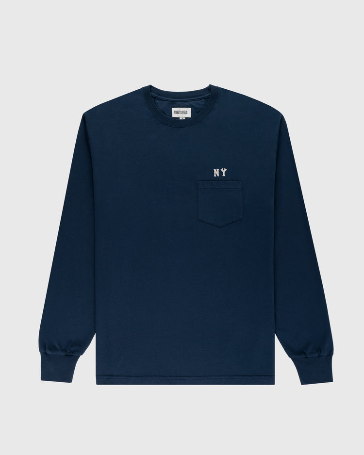 The Ebbets Field New York Black Yankees Embroidered NY Long Sleeve Pocket Tee features navy fabric, a left chest pocket, and small white NY lettering above the pocket, shown against a plain light background.