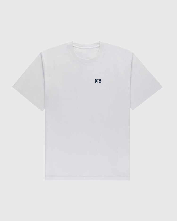 The Ebbets Field New York Black Yankees Embroidered NY Short Sleeve Tee features a plain white design with a small, dark NY emblem on the left chest, honoring the Black Yankees, displayed on a light gray background.
