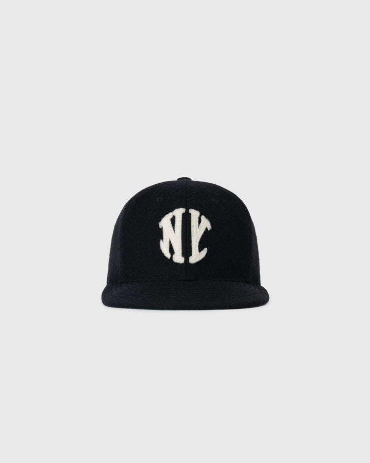 The EFF New York Knickerbockers 1912 Authentic Wool Ballcap is a vintage-style black cap with a white NY logo, modeled after the original 1912 design, shown on a plain light gray background.