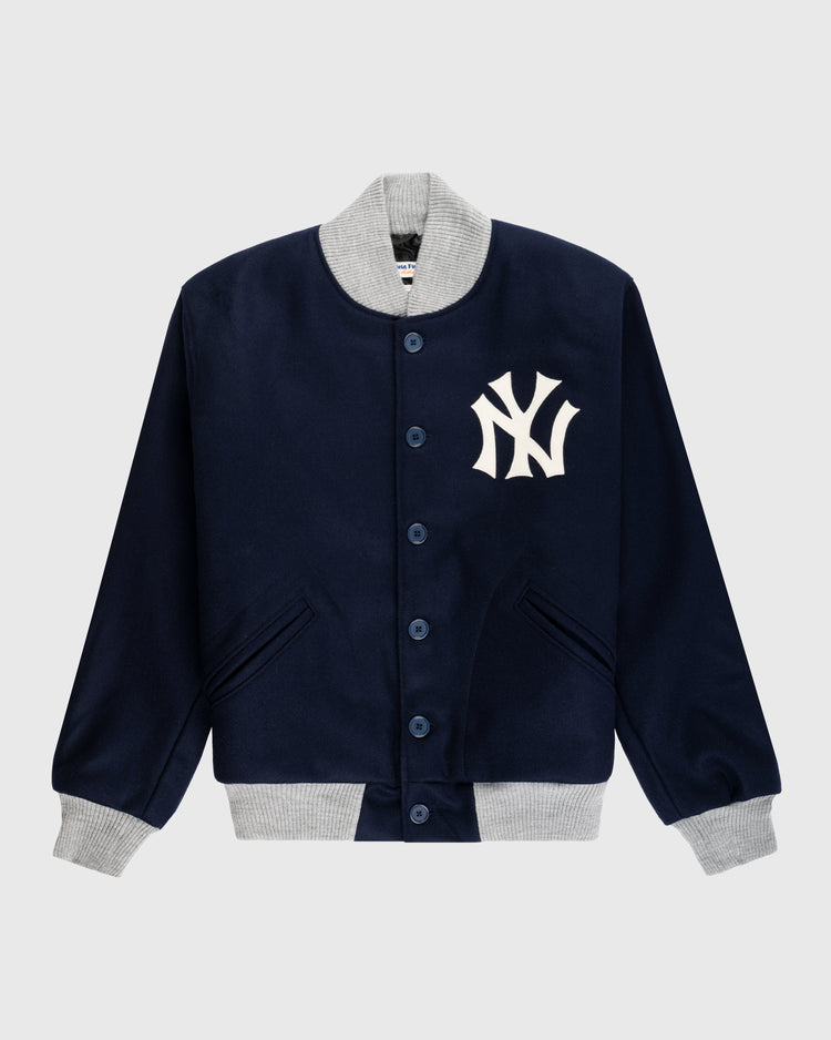 The EFF New York Yankees 1936 Authentic All Wool Varsity Jacket features a navy design with gray ribbed trim, blue center buttons, and a bold white NY logo on the chest, inspired by the classic 1936 on-field style.