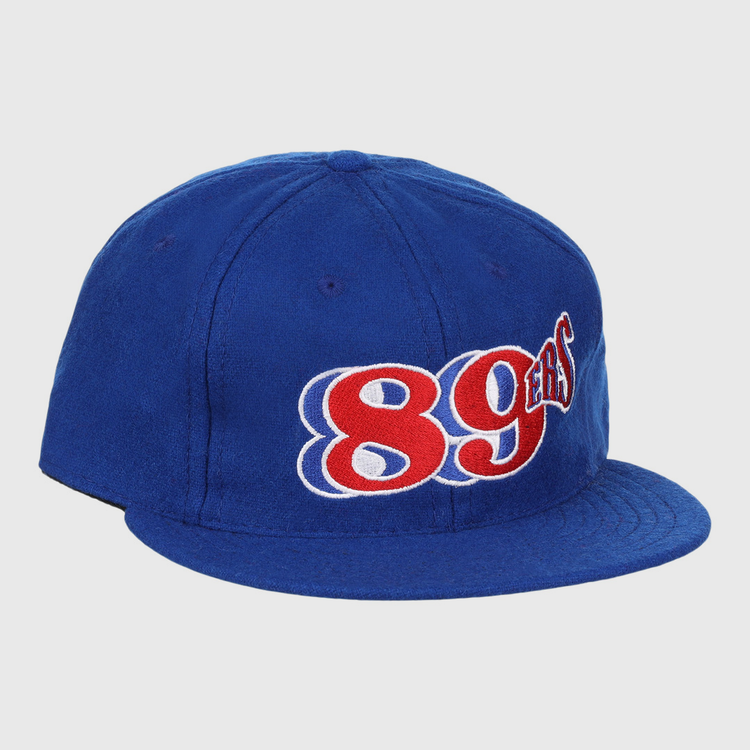 The EFF Oklahoma City 89ers 1994 Vintage Ballcap features a royal blue design with 89ers embroidered in bold red and white on the front—an authentic reproduction of a classic cap.