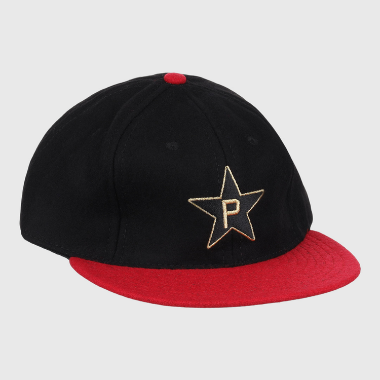 The EFF Philadelphia Stars Gilded Collection Ballcap features a black crown, red brim and button, and a gold embroidered star with a ‘P’ logo, honoring the Negro National League legacy.