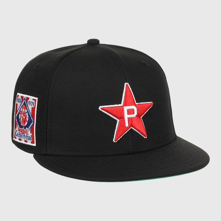 The EFF Philadelphia Stars NLB Team Color Fitted Ballcap features a black design with an embroidered white P Star logo and a colorful 1939 Baseball Centennial patch honoring the Negro National League.