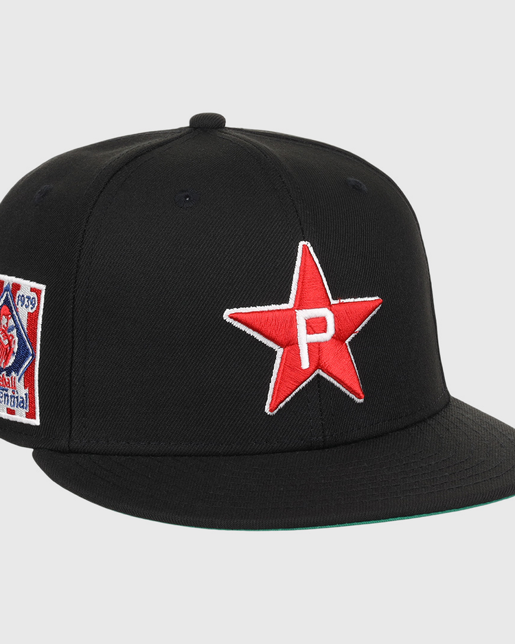 The EFF Philadelphia Stars NLB Team Color Fitted Ballcap features a black design with an embroidered white P Star logo and a colorful 1939 Baseball Centennial patch honoring the Negro National League.
