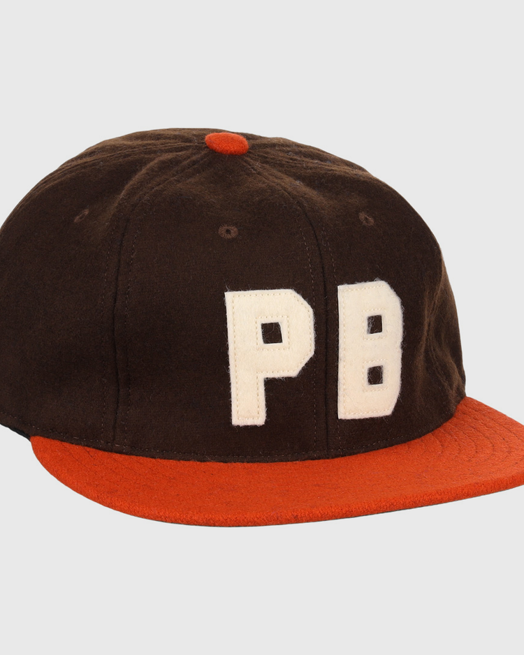 The Pine Bluff Judges 1953 Vintage Ballcap by EFF features a red brim, red top button, and bold white PB stitching—faithfully recreating the classic Cotton States League design.