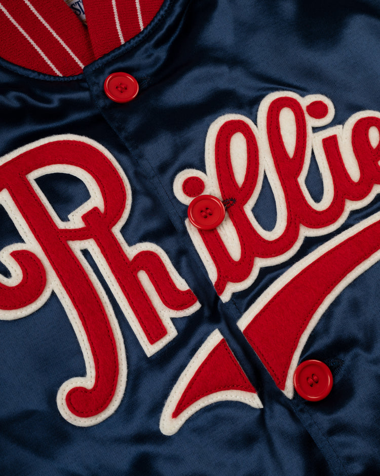 Close-up of the EFF Philadelphia Phillies 1937 Authentic All Satin Varsity Jacket, featuring blue satin fabric, red buttons, and red-and-white Phillies embroidery inspired by the classic 1937 Baker Bowl style.