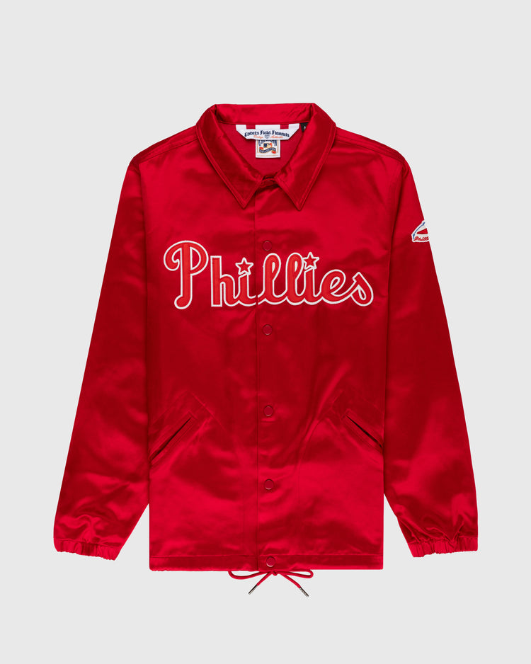 The EFF Philadelphia Phillies 1950 Satin Windbreaker Jacket features bold red satin, “Phillies” in white script, a team sleeve patch, collar, snap buttons, and adjustable waist—ideal for MLB vintage fans.