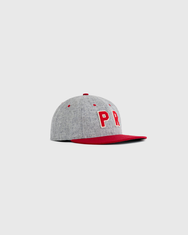 The EFF Puerto Rico All-Star Team 1939 Authentic Wool Ballcap is gray with a red brim and button, featuring bold white and red PR letters on the front, displayed against a plain light background.