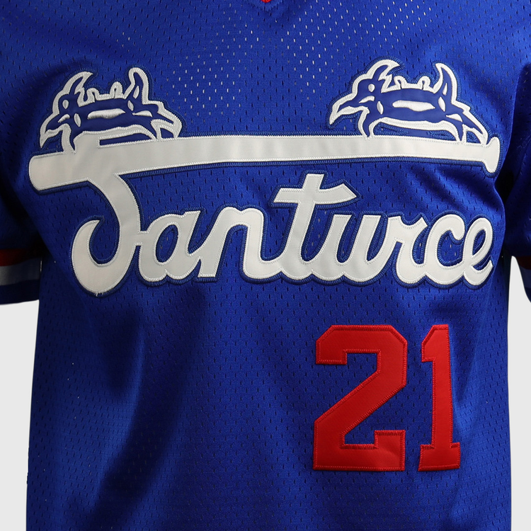 The EFF Roberto Clemente Santurce Cangrejeros Vintage Inspired NL Replica Royal Mesh Jersey features white Santurce script, two white and blue crab graphics, and red number 21 on the lower right honoring the legendary player.