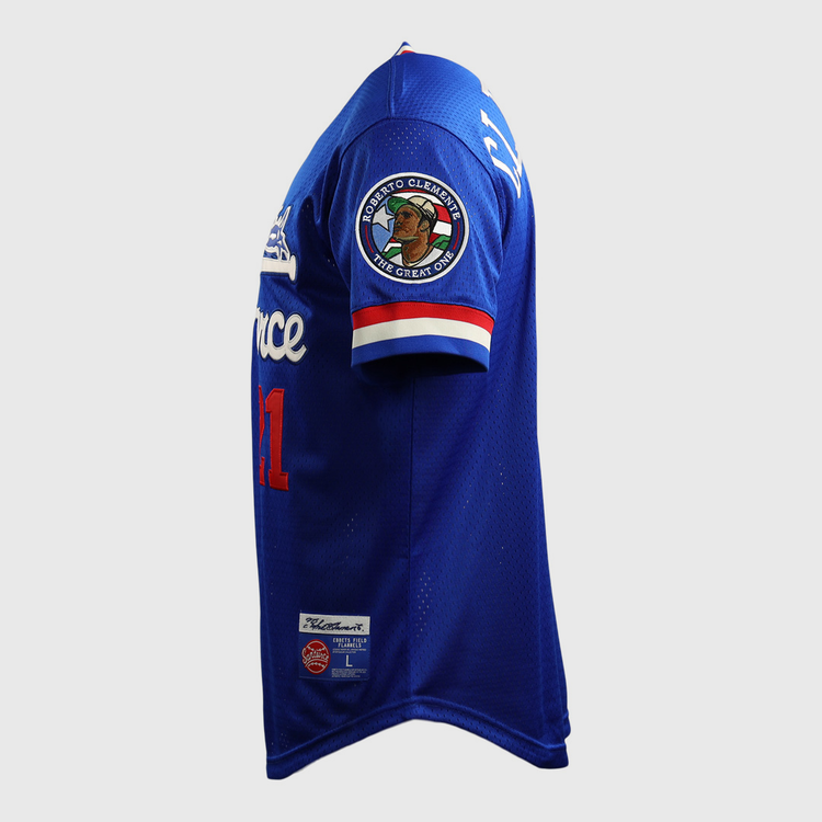 The EFF Roberto Clemente Santurce Cangrejeros Vintage Inspired NL Replica V-Neck Mesh Jersey in royal blue features red and white trim, a #21 on the front, sleeve patch, and sewn Ebbets Field Flannels tags near the hem.