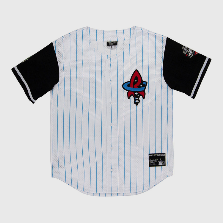 The Ebbets Field Rocket City Trash Pandas MiLB Button Down Jersey is white with thin blue stripes, black sleeves, a red and black rocket logo on the chest, and patches on the lower front and left sleeve.