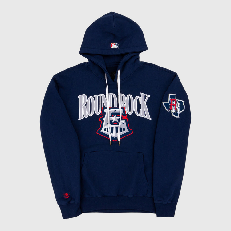 The Ebbets Field Round Rock Express MiLB Cotton Hooded Sweatshirt features navy blue fabric, ROUND ROCK in large white letters on the chest, an emblem below, a left sleeve patch with an R and Texas outline, a front pocket, and white drawstrings.